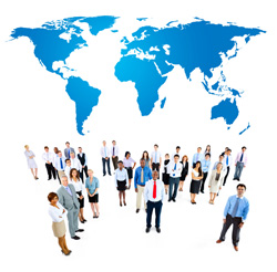 Group of people under a map of the world