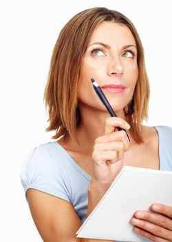 Woman with pen and paper